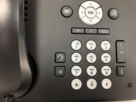close up IP phone with numeric keypad for calling out to customersの写真素材