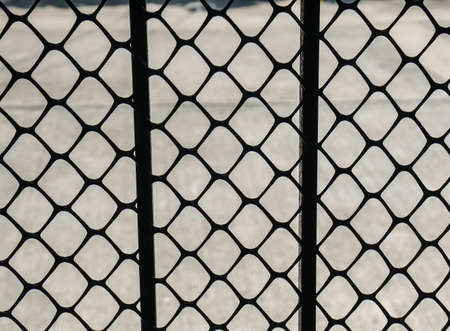 steel fence with thick grid net for securityの写真素材