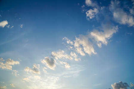 noise with grain on blue sky with some white clouds in summerの写真素材