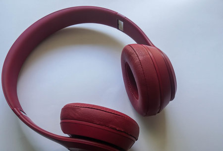 isolated selective focus women pink fold able headphone