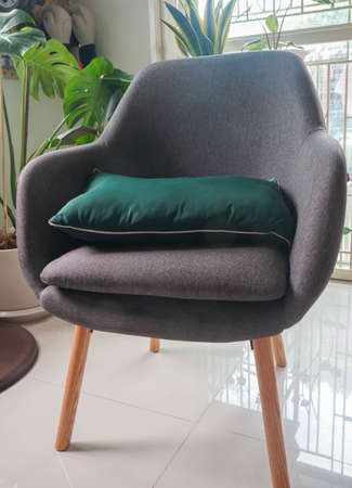 close up fabric grey chair in living room at modern houseの写真素材