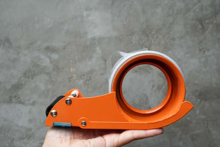 transparent adhesive tape metal blade for packing parcel of online shopppingの写真素材