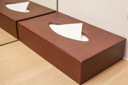 close up brown tissue sheet in the box in hotel bedroom for cleansing and sanitaryの写真素材