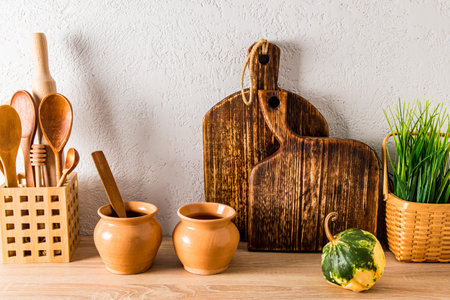 front view of the kitchen countertop of a country house, cottage. homemade kitchen boards, wooden...