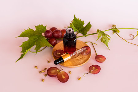 an open bottle with a cosmetic and a pipette filled with it for facial skin care. vitamin E,...