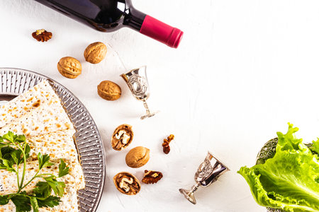 festive Passover Jewish background. traditional objects and products on a white background. topview. copy spaceの写真素材