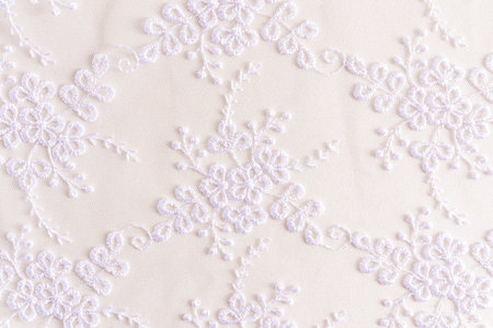 Beautiful lace white background. white lace with small flowers. wedding background.の写真素材