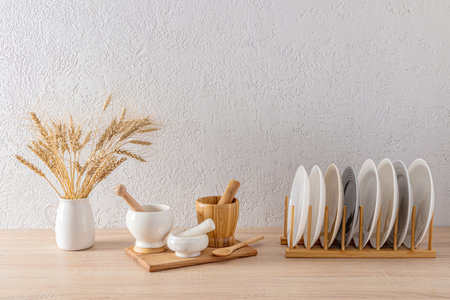 Beautiful kitchen countertop interior with various kitchen utensils and decor in light colors. ecologically clean kitchen. Eco itemsの写真素材