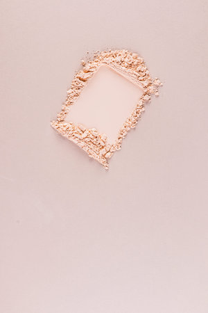 A sample of loose powder for makeup. A universal shade for all skin types. The top vertical view with a copy space. Layout of natural cosmeticsの写真素材