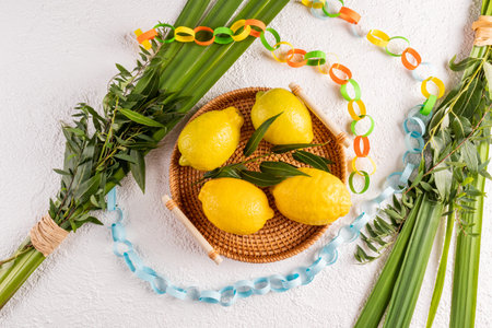 A beautiful festive composition for the holiday of Sukkot. Traditional symbols citrus etrog, palm...