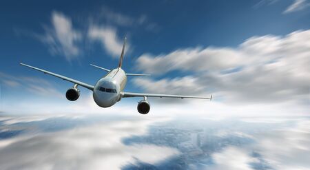 Airplane fly over the cloudsの写真素材