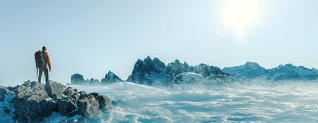 Hiker in winter landscapeの写真素材