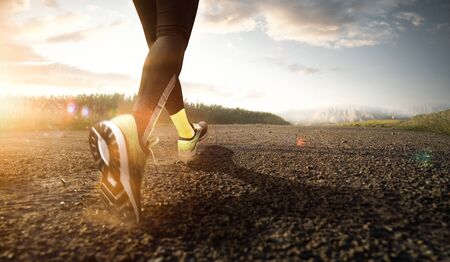 Jogger keeps fit with sportsの写真素材