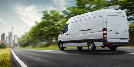 delivery truck delivers quicklyの写真素材