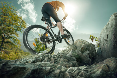 mountain biker rides off-road