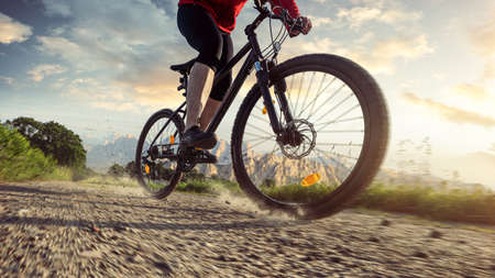 mountain biker rides off-roadの写真素材