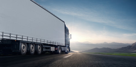 Truck on the road at sunset, transportation and logistics concept.の写真素材