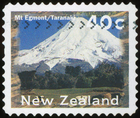 NEW ZEALAND - CIRCA 1996: A stamp printed by New Zealand, shows Scenic Views Type, Mt. Egmont, Taranaki, circa 1996のeditorial素材