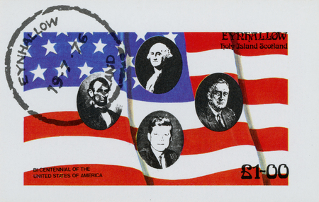 USA - CIRCA 1976: A stamp printed in USA shows an American Flag flying in the breeze, with Presidents of USA , circa 1976のeditorial素材