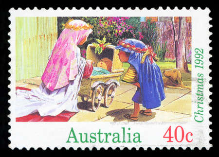AUSTRALIA - CIRCA 1992: A stamp printed in the Australia shows Children Dressed as Mary and Joseph with Baby Carriage, Christmas, circa 1992のeditorial素材
