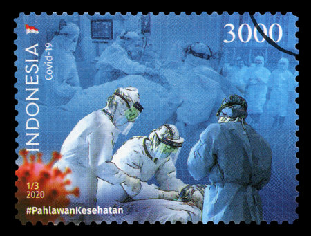 INDONESIA â€“ CIRCA 2020: A postage stamp printed in Indonesia showing an image of the pandemic...