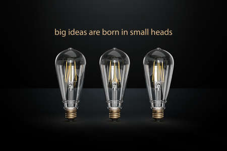 Concept of three retro bulbs placed on a black gradient background with the words "big ideas are born in small heads" - 3d illustrationの写真素材