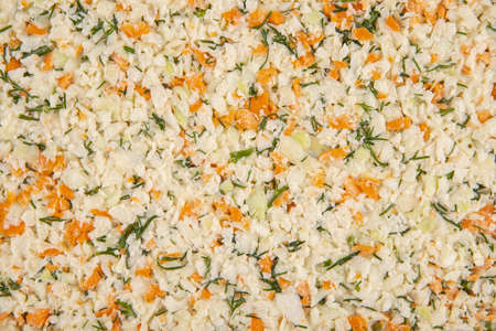 Vegetable salad texture - top view and closeup of mixed vegetablesの写真素材