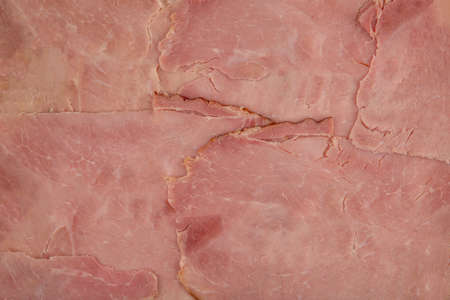 Ham texture - top view and close-up of large slices of cooked smoked hamの写真素材