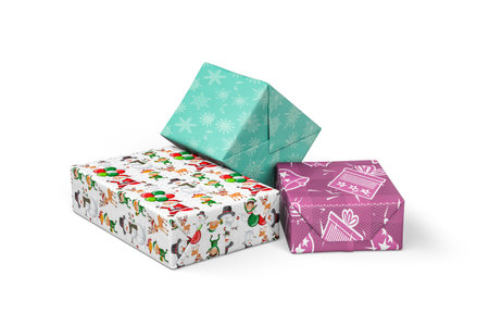 Christmas gifts - three cardboard boxes wrapped in paper with Christmas theme on white background - copy space - 3D renderの写真素材