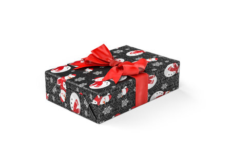 Christmas gift - cardboard box wrapped in paper with a Christmas theme isolated on a white background - copy space - 3d renderの写真素材