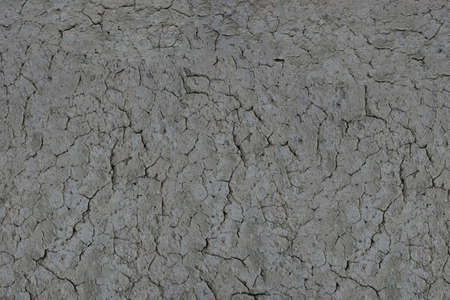 Concrete texture - close-up on a fragment of the old concrete floorの写真素材