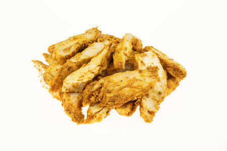 Baked chicken breast strips in seasoning isolated on white background - Packshotの写真素材