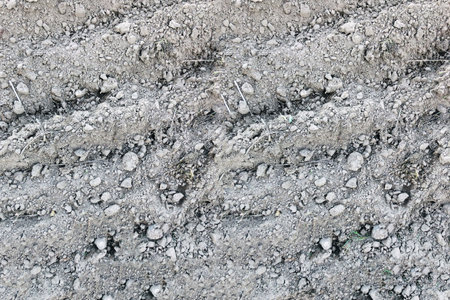 Ground texture - close-up of a part of a plowed fieldの写真素材