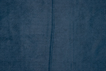 Texture of crumpled blue fabric - top view and close-up of a piece of blue linen fabricの写真素材