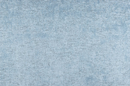 Light blue fabric texture - top view and close-up on a piece of ecru linen fabricの写真素材