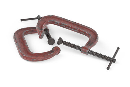 Old red clamp isolated on white background - 3D renderの写真素材