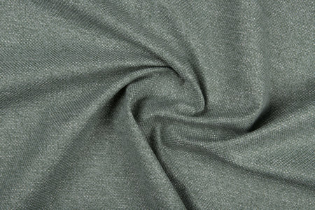 Green fabric texture - top view and close-up of a piece of crushed and twisted green linenの写真素材