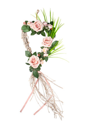 Heart shaped door wreath isolated on white backgroundの写真素材