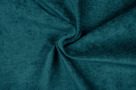 Turquoise fabric texture - top view and close-up of a piece of crushed and twisted turquoise linenの写真素材