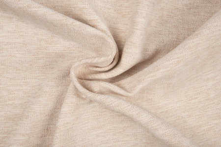 Beige fabric texture - top view and close-up of a piece of crushed and twisted brown linenの写真素材