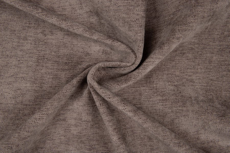 Brown fabric texture - top view and close-up of a piece of crushed and twisted brown linenの写真素材