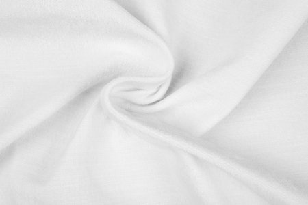 White fabric texture - top view and close-up of a piece of crushed and twisted white linenの写真素材
