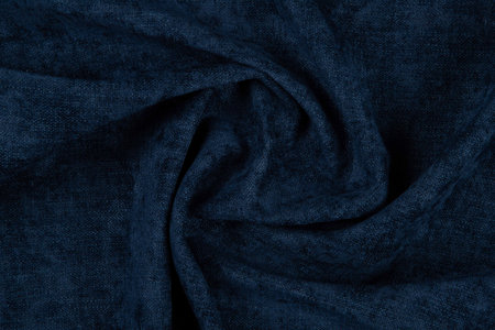 Blue fabric texture - top view and close-up of a piece of crushed and twisted brown linenの写真素材