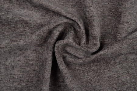 Brown fabric texture - top view and close-up of a piece of crushed and twisted brown linenの写真素材