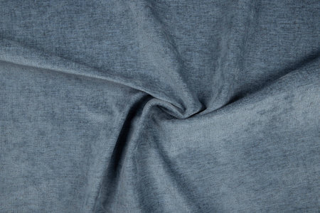 Blue fabric texture - top view and close-up of a piece of crushed and twisted brown linenの写真素材
