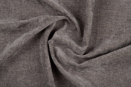 Brown fabric texture - top view and close-up of a piece of crushed and twisted brown linenの写真素材