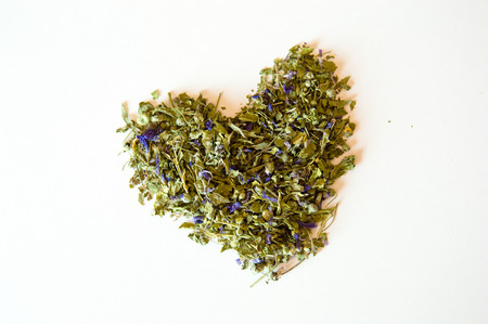 Love for mallow herbal tea isolated closeup on white backgroundの写真素材