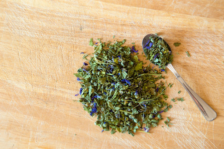 Mallow herbal tea spoon on woodの写真素材
