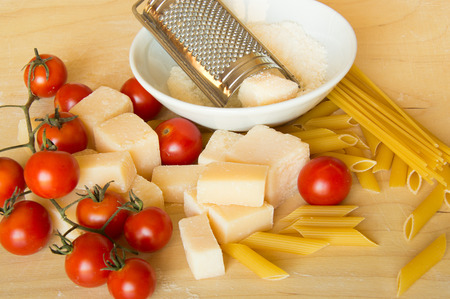 Italian grana padano with pasta  and tomatoesの写真素材