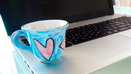 Passion and love for computer, work and coffeeの写真素材